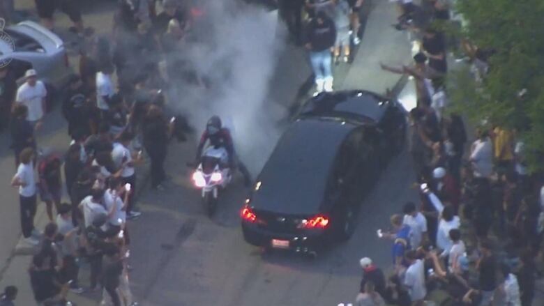 A screenshot taken from video captured by the York Regional Police aerial unit of an illegal car rally in July, 2023.