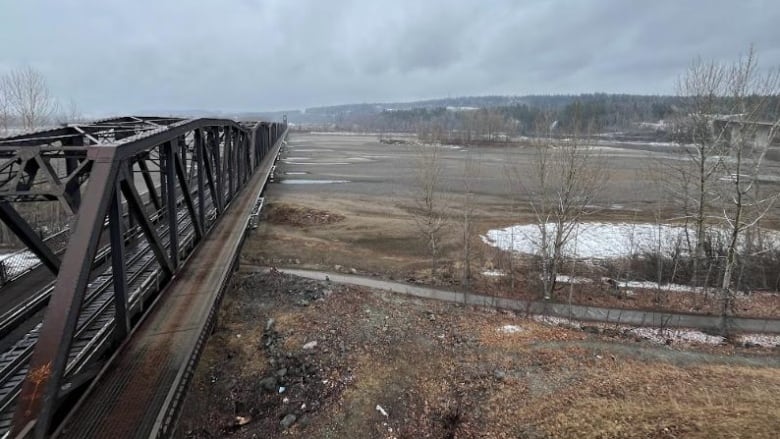 train bridge over dry river bed