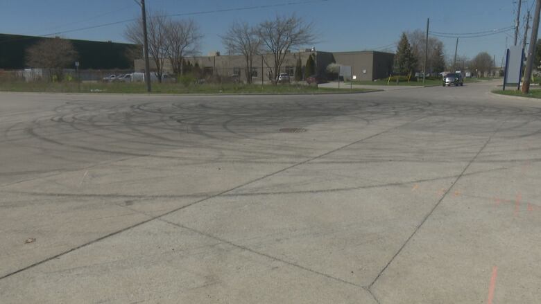 Tire marks in circles on pavement