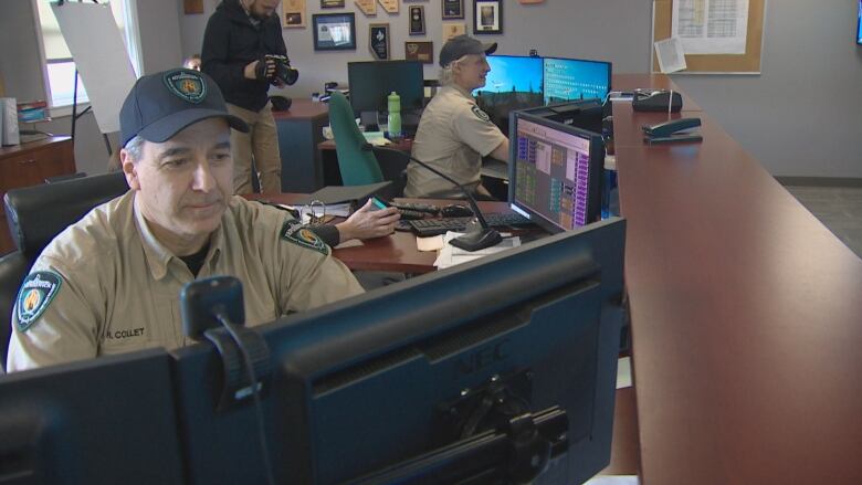 Roger Collet works at a desk