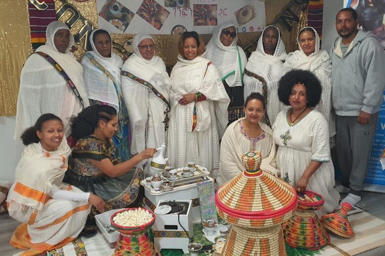 A group of women wearing traditional Ethiopian clothes. 