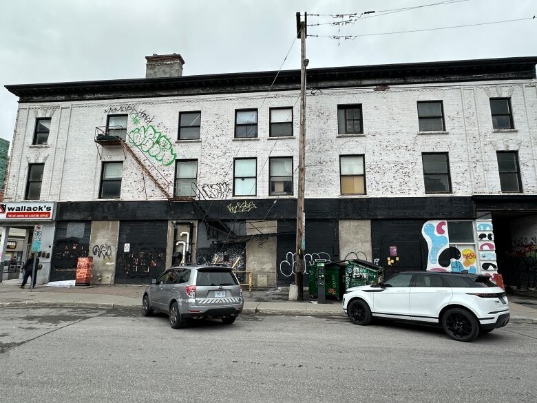 Apartments above a former arts supply store in a city.