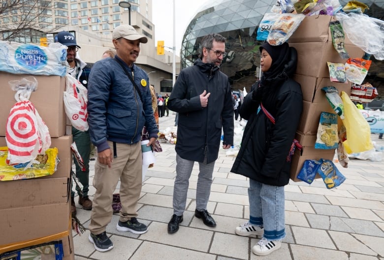 people on the street talking