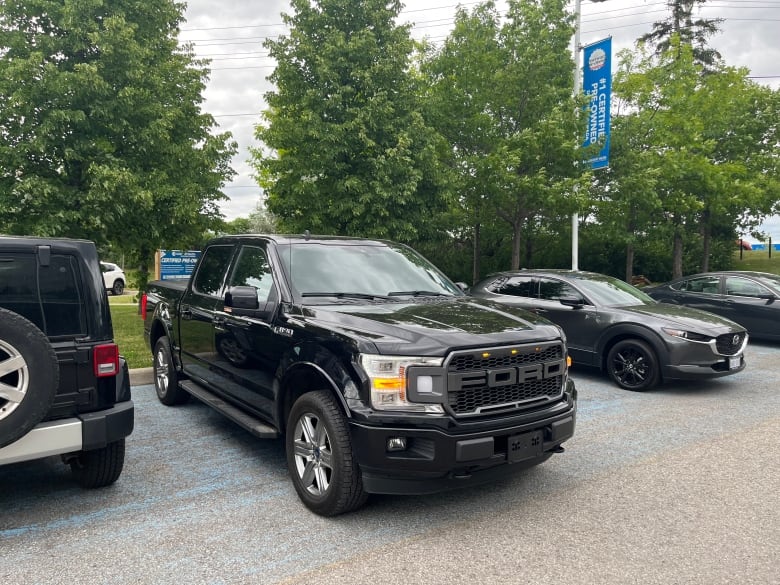 A Ford F-150 in an outdoor parking lot.