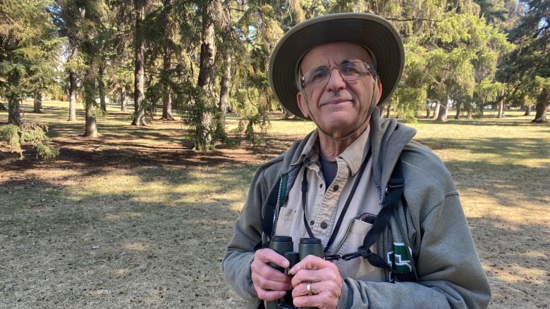 Stan Shadick of Saskatoon Custom Bird Tours spent part of Earth Day wandering through the spruce trees in his neighbourhood park in Saskatoon.