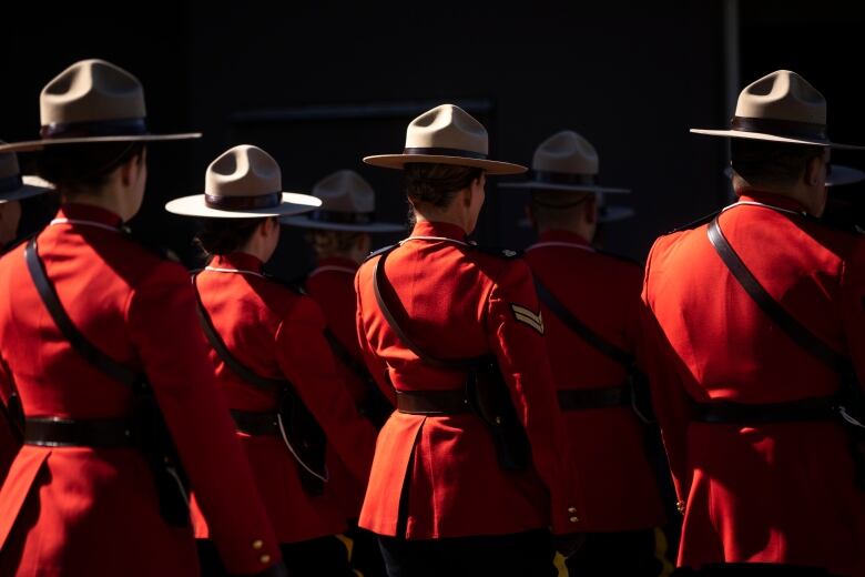 RCMP members are pictured wearing their red serge uniforms during a Change of Command ceremony in Langley, British Columbia on Tuesday, September 20, 2022. 