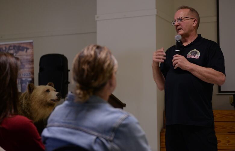 John Clarke with Canadian Bear Safety Authority, presents to a crowd about bear safety in Blairmore sharing his expertice as a retired Alberta Fish and Wildlife Officer.