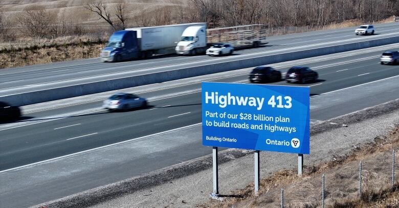 Aerial (drone) images of Highway 400 with an Ontario government announcing the future site of Highway 413. 