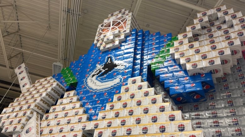 A Canucks goalie made of Pepsi boxes.