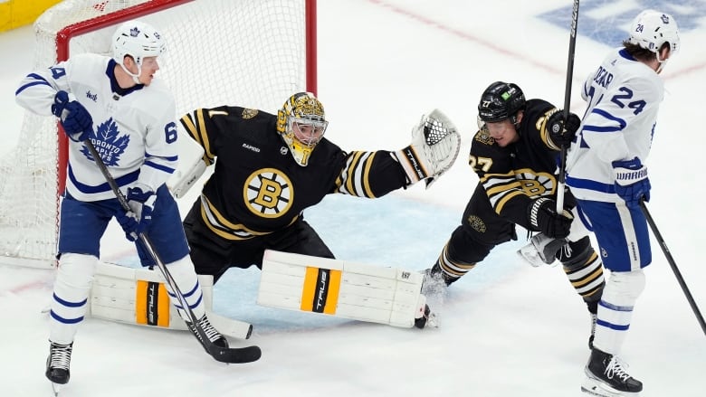 A goalie makes a save.