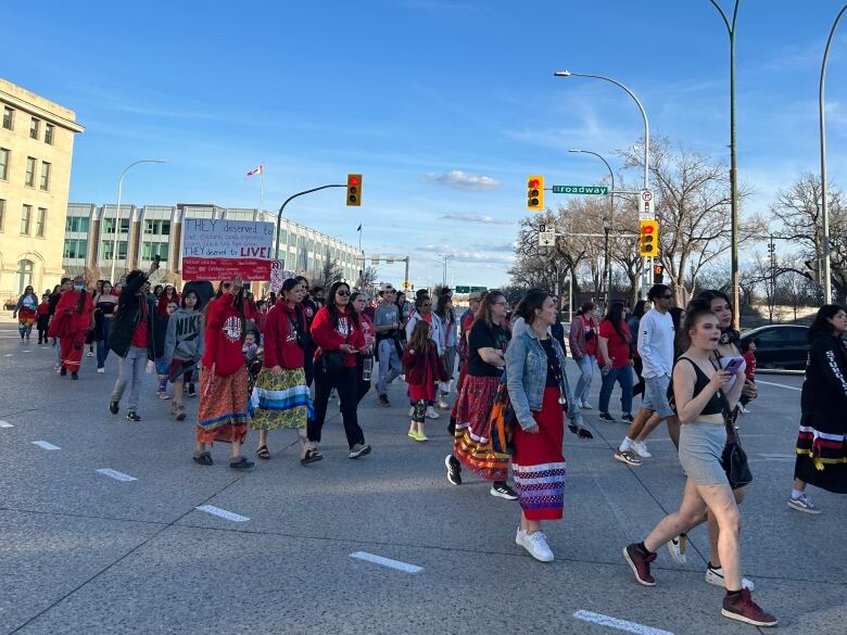 People marching in a big group. 