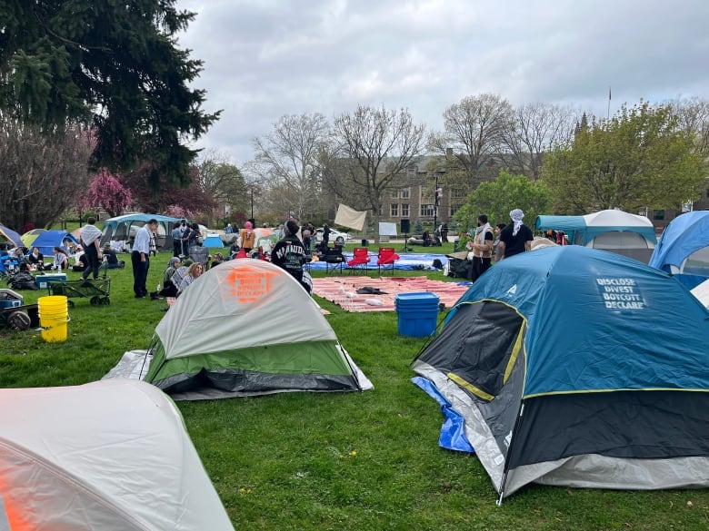 Tents on a field.