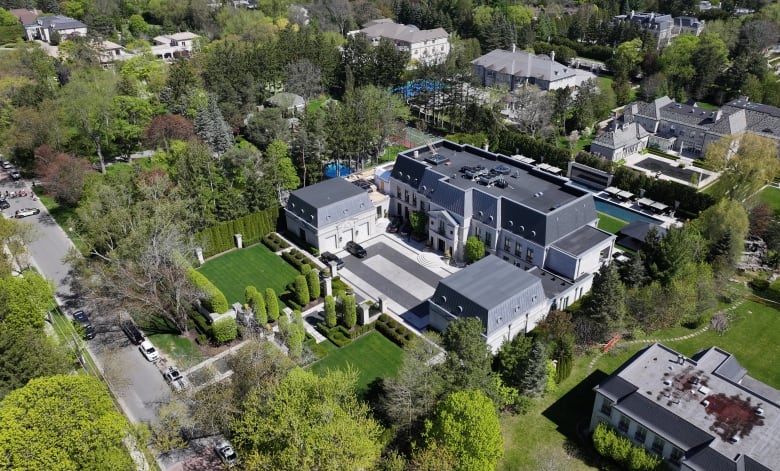 Aerial (Drone) images of the mansion belonging to Drake on the Bridal Path, after overnight shooting. Police tape and TPS shown.