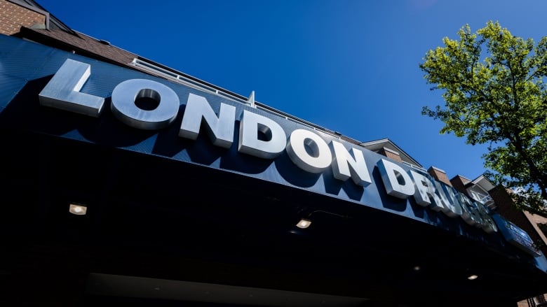 A sign with the words 'London Drugs' on a store.