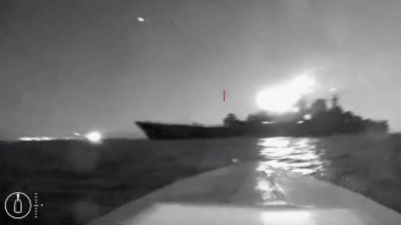 In this image taken from video released on Friday, Aug. 4, 2023, a drone manoeuvres as it approaches a vessel claimed to be a Russian large landing ship, the Olenegorsky Gonyak, close to the Black Sea port of Novorossiysk. Russia had accused Ukraine of attacking its Black Sea navy base in the port of Novorossiysk with sea drones.