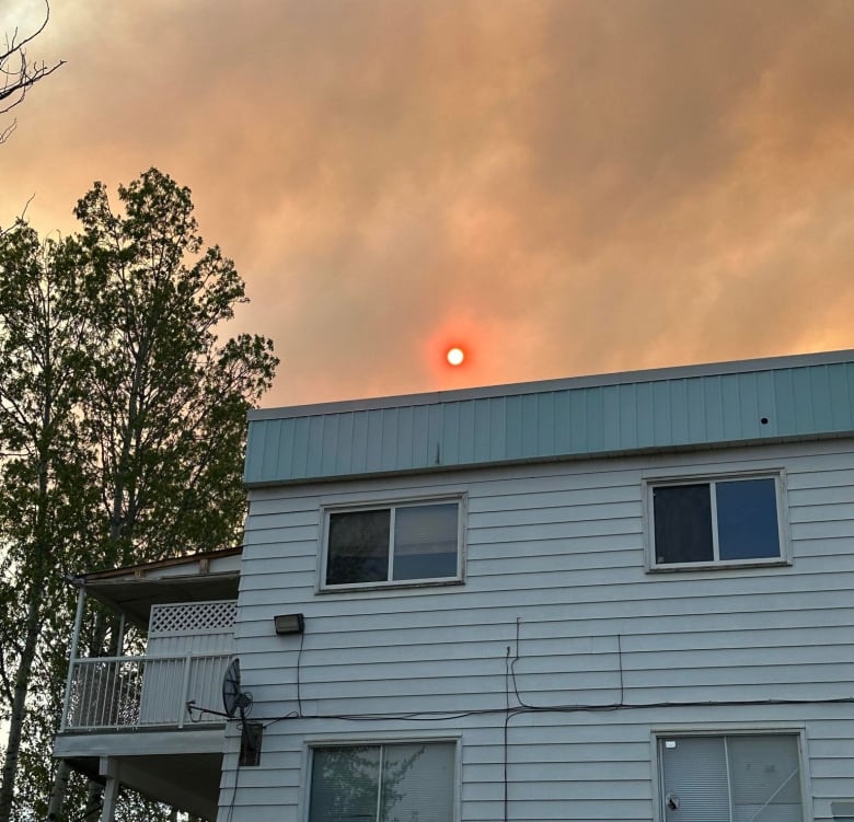 A red sun through wildfire smoke.