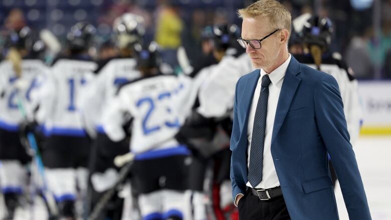 PWHL male head coach of New York walks off the ice after the game against Toronto at Total Mortgage Arena on January 05, 2024 in Bridgeport, Connecticut. Toronto defeated New York 3-2.  