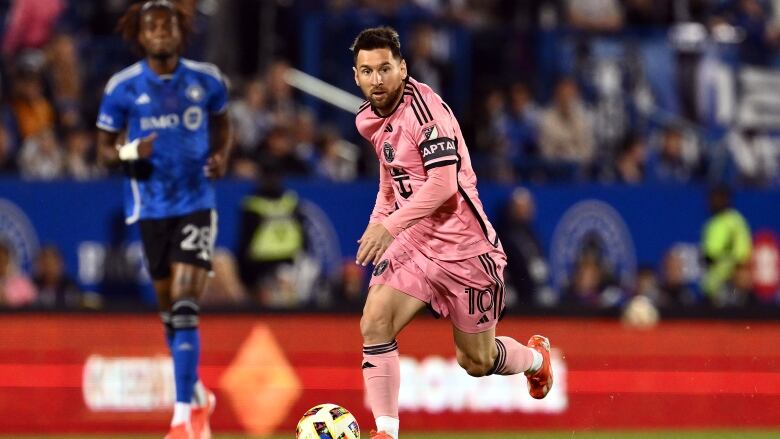 Male soccer player from Inter Miami dribbles the ball against CF Montral during the second half at Saputo Stadium on May 11, 2024 in Montreal, Que.