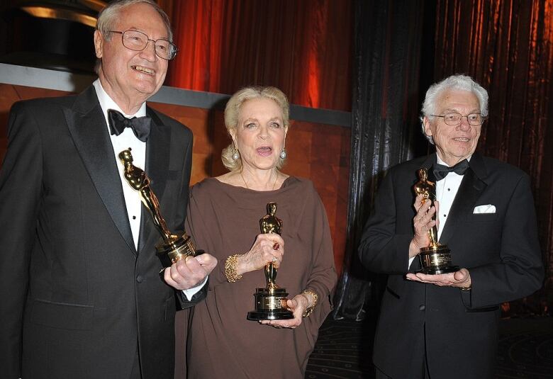 From left, producer-director Roger Corman , actress Lauren Bacall and cinematographer Roger Willis.