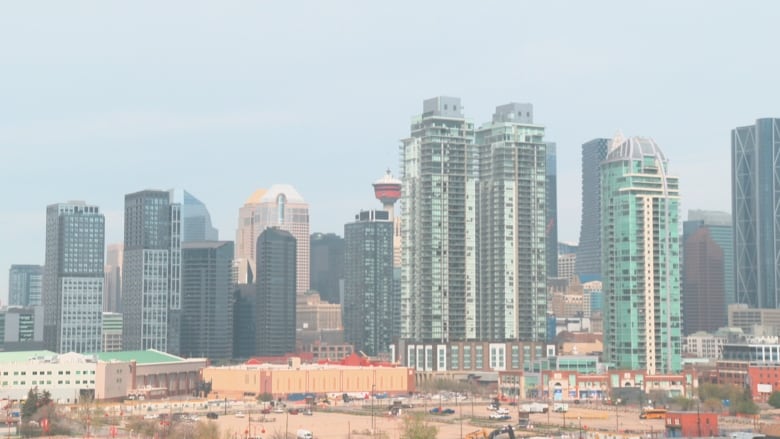 A picture of a hazy downtown skyline. 