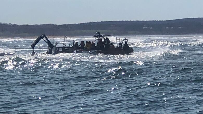 The rescue crew was able to quickly get the crew members off of the sinking mussel boat shortly after arriving on the scene.