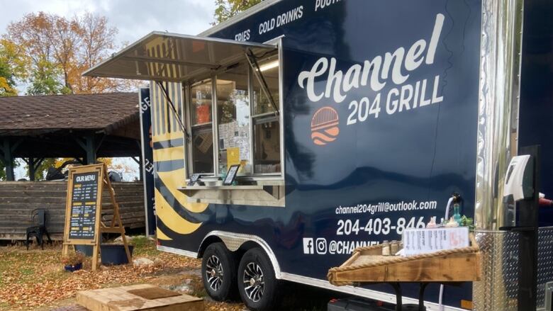 A food truck with the words 'Channel 204 Grill' on the side.