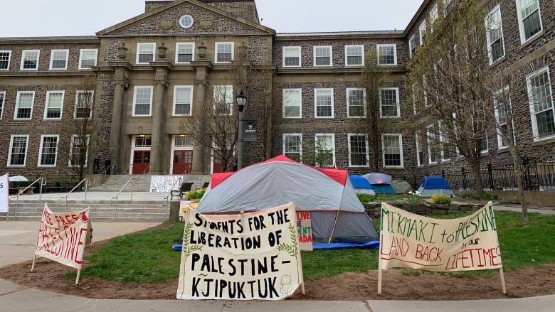 tents in front of a building.