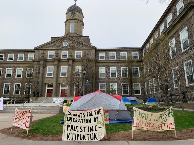 tents in front of a building.