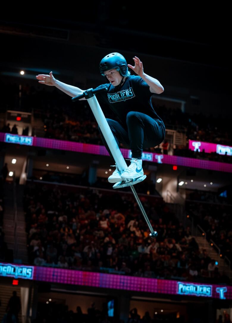 Man doing a pogo stick trick