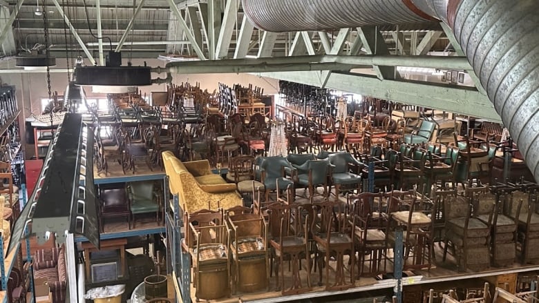 rows of chairs in a warehouse