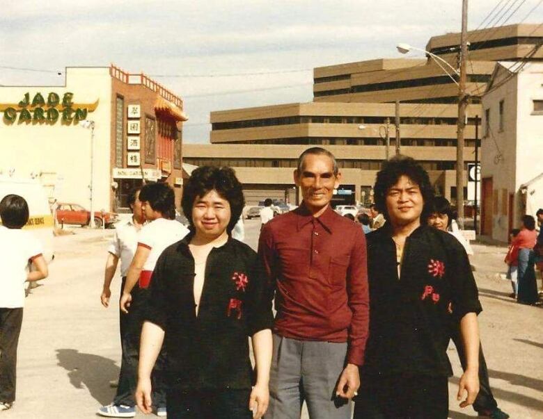 Henry Suen, right, in Calgarys Chinatown with a fellow student and their teacher, Lun Chi, middle, who was a first-generation grandmaster who learned directly from Bak Hsing Choy Li Futs founder, Tam Sam. 