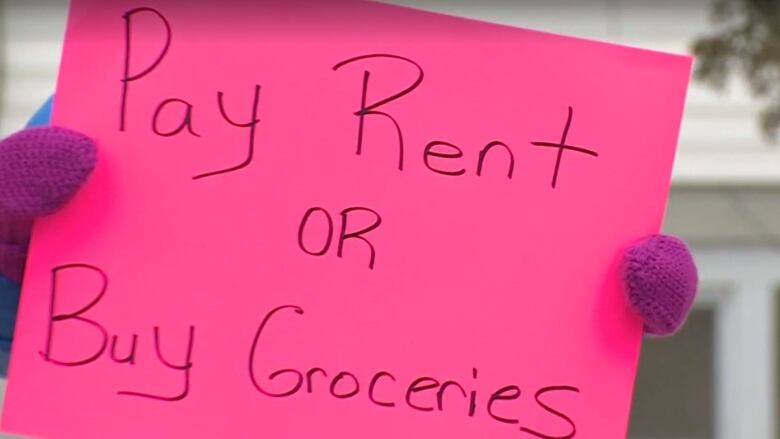 New Brunswick rent protest sign