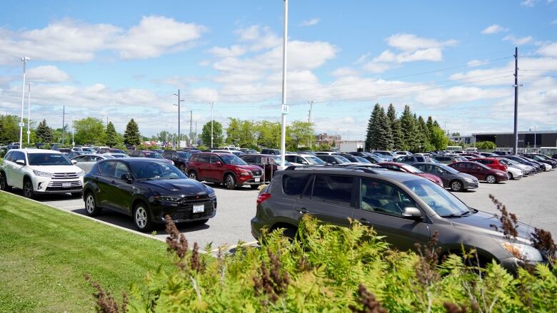 Cars parked at 100 Constellation Drive in Nepean