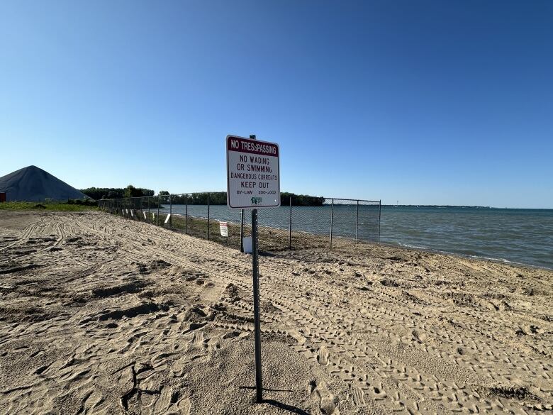 More signage warning of dangerous currents has been added to Sandpoint Beach.