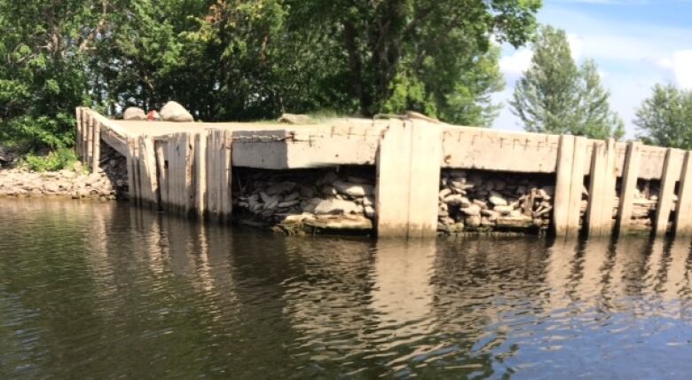 A concrete wharf in bad shape