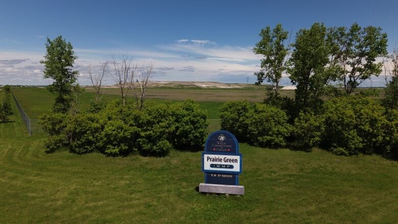 A sign that says 'Waste Connections Canada Prairie Green IWMF.'