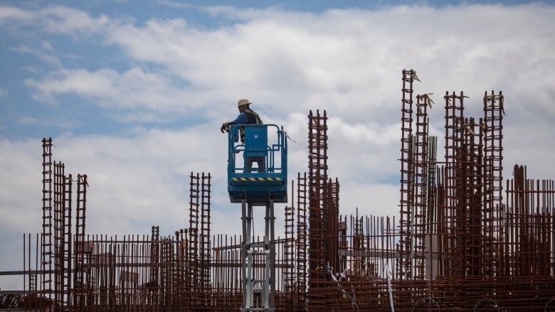 Construction workers are pictured working on the North Shore Wastewater Treatment Plant in North Vancouver Vancouver, B.C., on Friday, June 14, 2024.