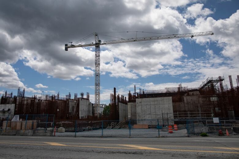 A construction site picture rebar and concrete structures.