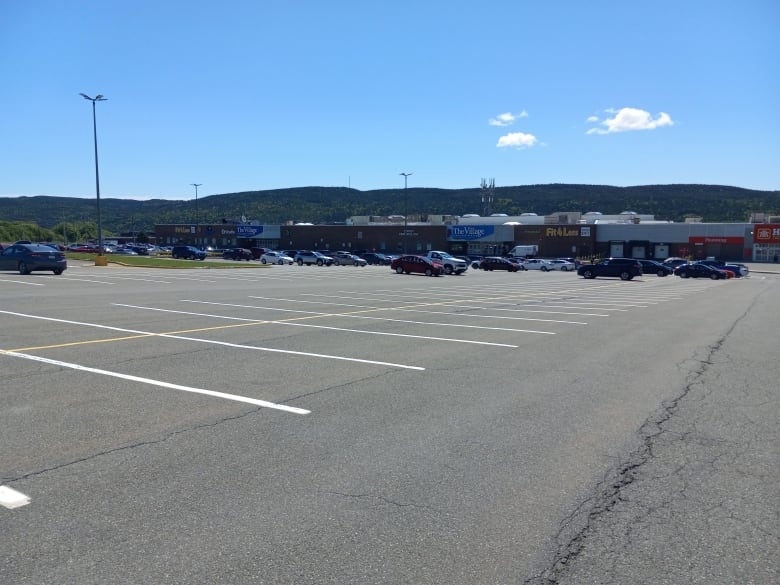 A parking lot with lots of empty spaces.