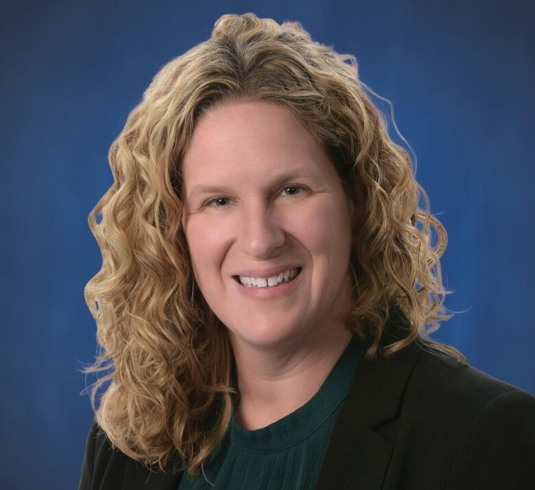 A headshot of a woman