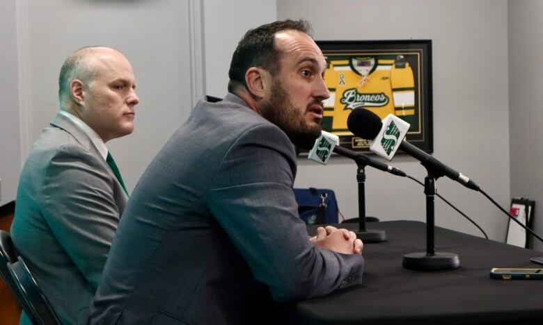 Saskatchewan Roughriders CFO Kent Paul (left) and CEO Craig Reynolds (right) discuss the team's 2023-24 financial report with media.