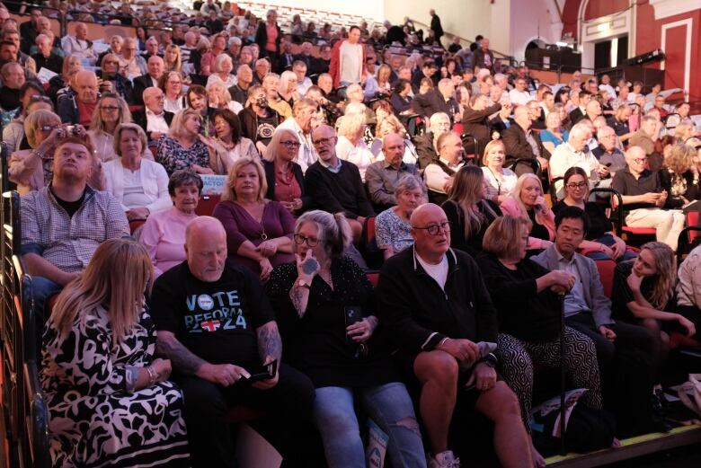 A packed auditorium at the Prince's theatre in Clacton came out to Nigel Farage earlier this week.  He says his Reform UK is drawing large crowds as it seeks to overtake Britain's Conservative party as the voice of those on the political right.   