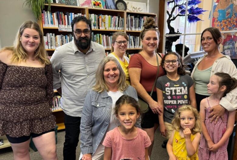 Group of readers smiles at camera