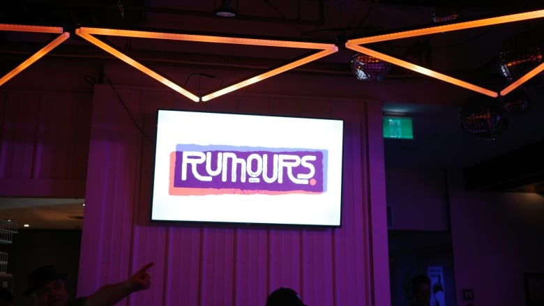 The new Rumours logo, seen on a flat-screen TV inside the bar. 