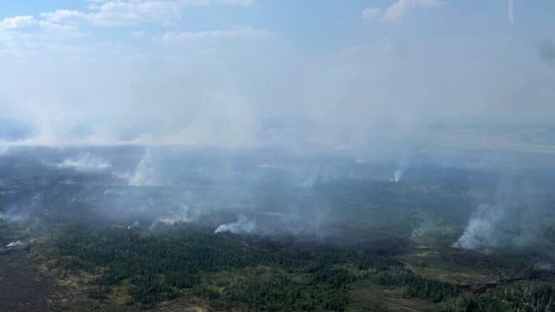 Drone shot of smoke in forest