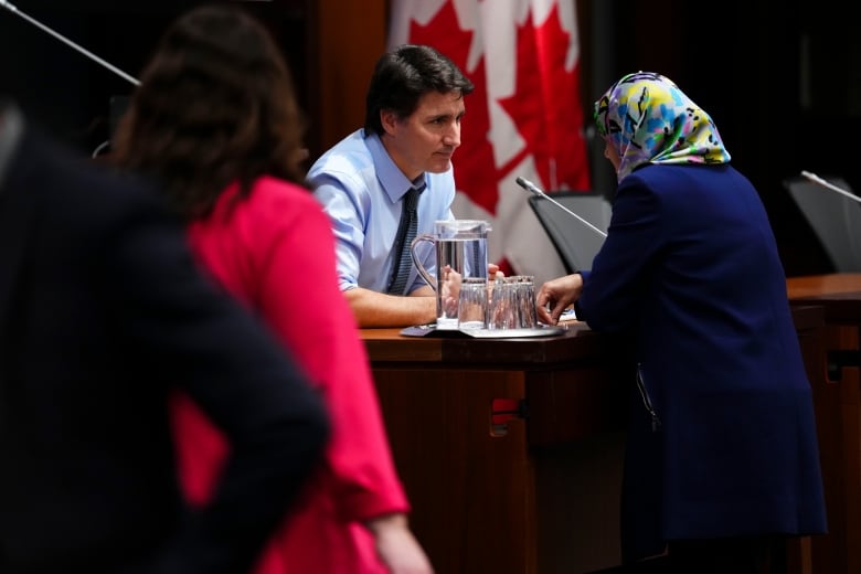 Prime Minister Justin Trudeau talks with member of Parliament Salma Zahid following his address to national caucus during a winter caucus retreat on Parliament Hill in Ottawa on Thursday, Jan. 25, 2024. THE CANADIAN PRESS/Sean Kilpatrick