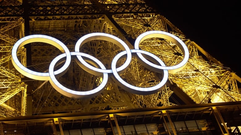 The Olympics rings on the Eiffel Tower.