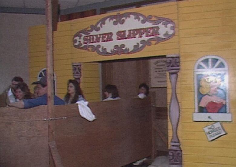 Video from 1986 shows patrons lined up at the Silver Slipper, a transformed hotel bar that was a popular off-ground Stampede drinking hole for years.