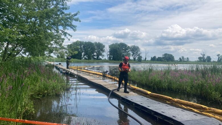 Worker on site of the oil spill