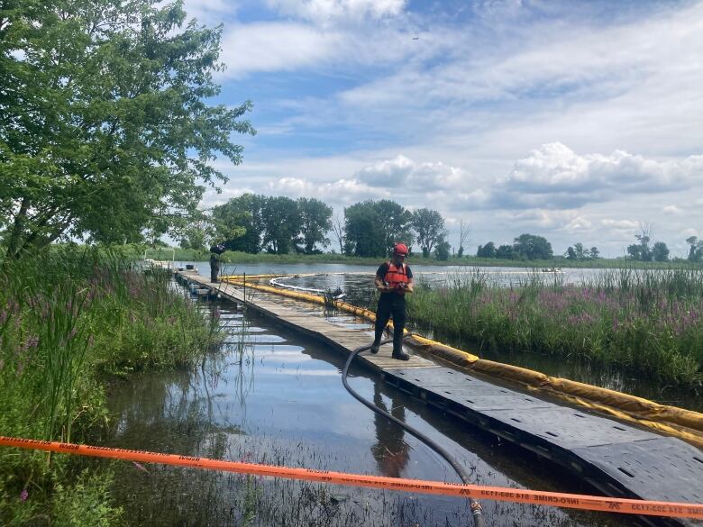 Worker on site of the oil spill